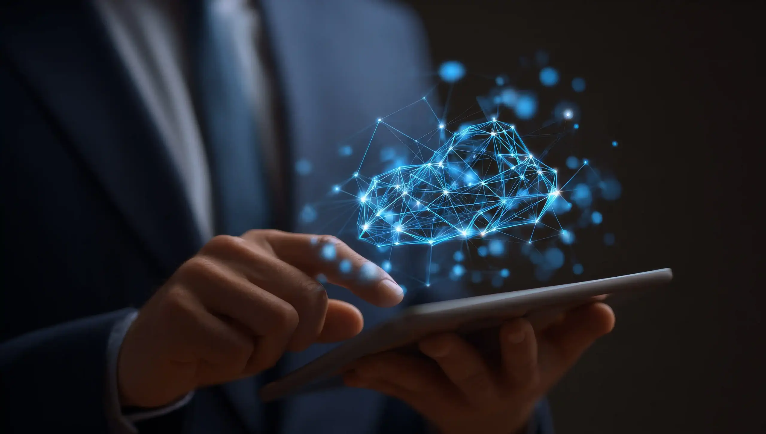 A tablet is being held by someone, showing a digital illustration of cloud computing, where cloud tech is visualized on the screen, and this represents the modern business use of cloud services.