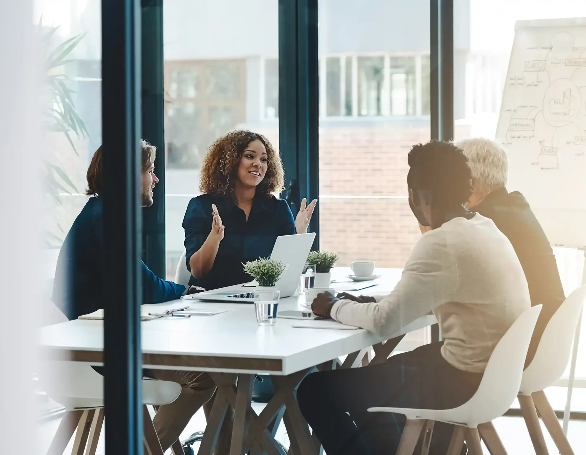 Planning, teamwork and meeting with business people in boardroom for strategy, brainstorming and solution. Corporate, collaboration and conference with employees in office for negotiation development